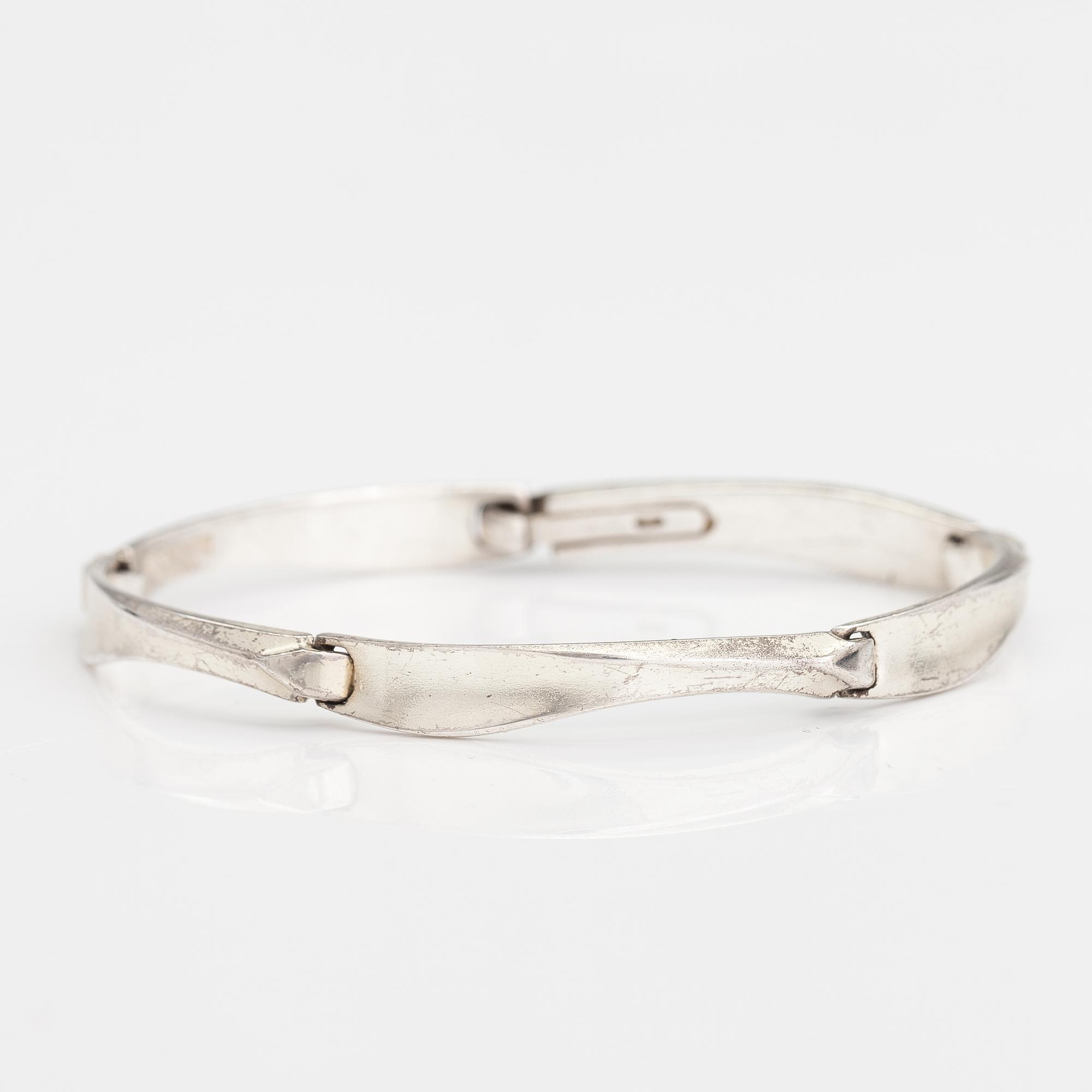 LAPPONIA, A sterling silver necklace, bracelet, brooch and earrings. 1984-87.