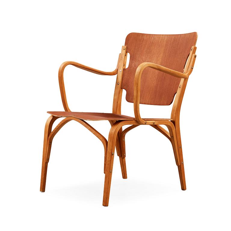 A Carl-Axel Acking beech and mahogany armchair, Svenska Möbelfabrikerna, Bodafors 1940's.