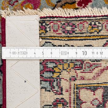 An antique Isfahan carpet, circa 342 x 250-260 cm.