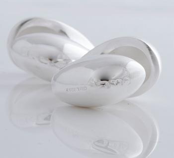 A pair of cufflink, by Ole Lynggaard.