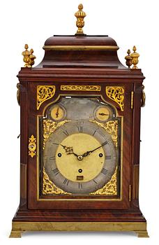 1068. An Eardley Norton musical eight-bells and quarter chiming mahogany bracket clock playing four different tunes, verge escapment and engraved backplate.