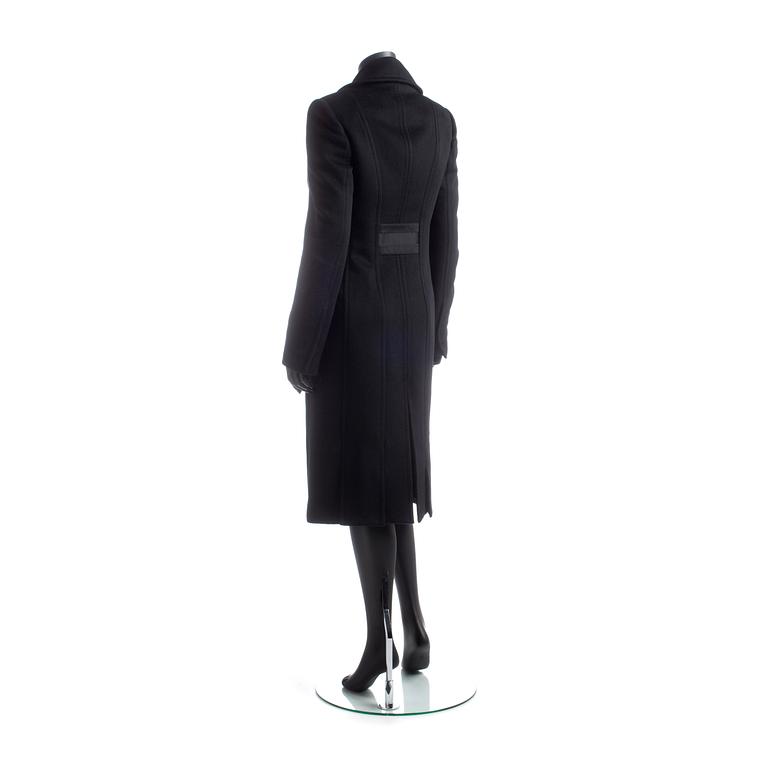 GUCCI, a black wool blend coat.