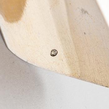 A Russian silver, parcel-gilt tea caddy spoon, Moscow from around the turn of teh century/ early 20th century.