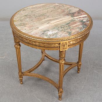 An early 20th century Louis XVI style table.