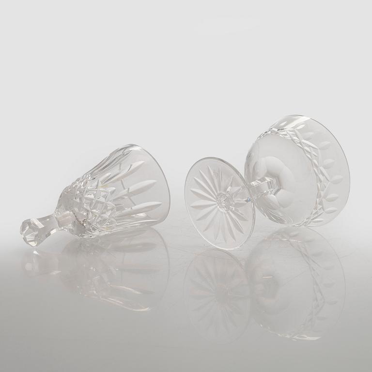 A set of 13 dessert bowls / champagne glasses, Waterford. and a table clock.