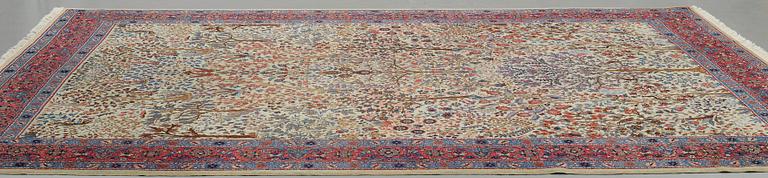 A CARPET, a semi-antique Tabriz probably, ca 393 x 284 cm.