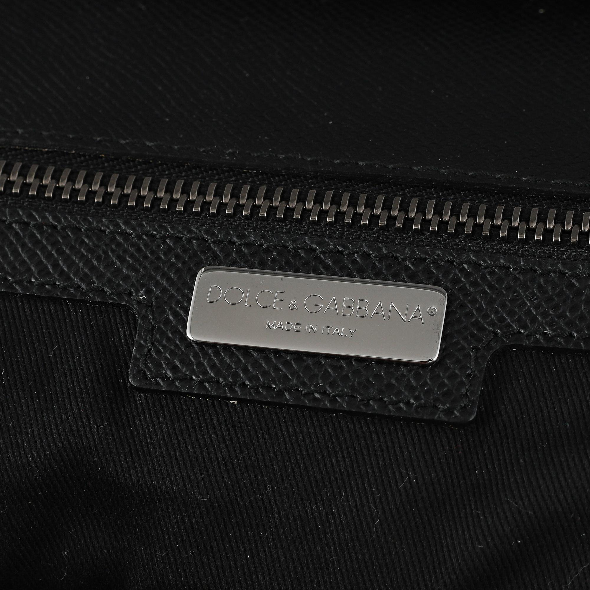 Dolce & Gabbana, a black leather weekend bag.