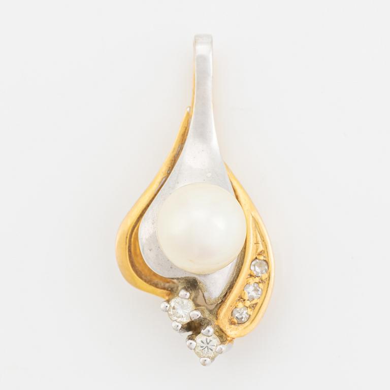 18K gold, cultured pearl and diamond pendant.