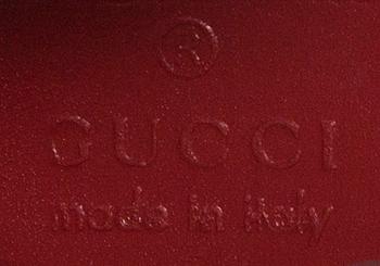 LAUKKU, Gucci.