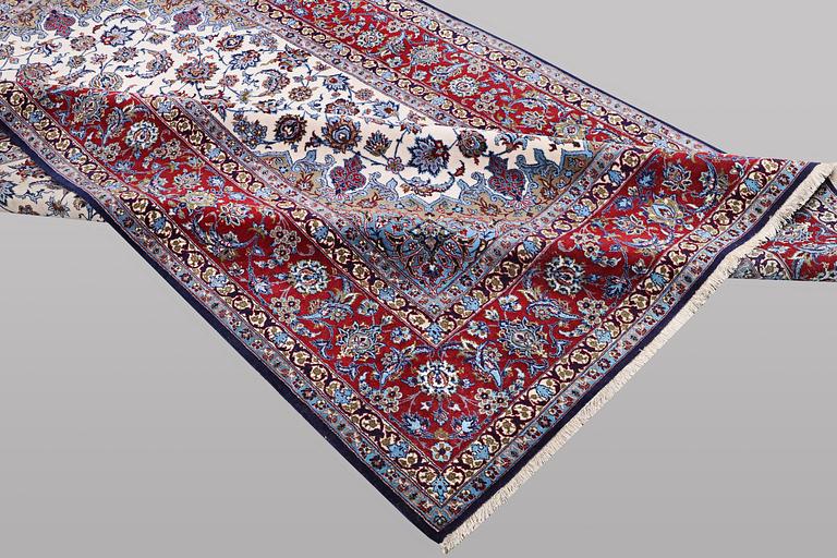 A rug, Esfahan, silk warp and part silk pile, ca 245 x 155 cm.