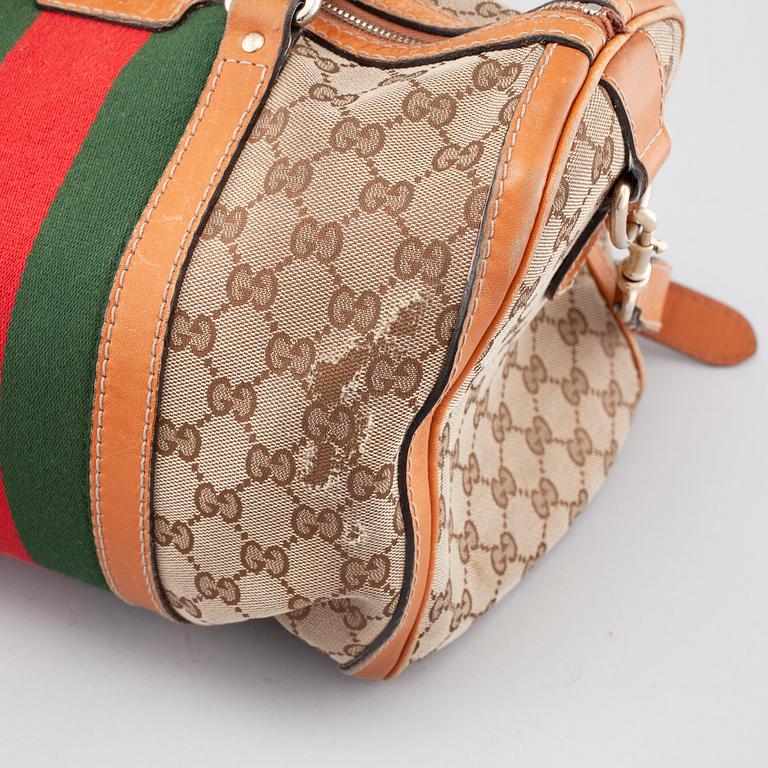 GUCCI, a bag.