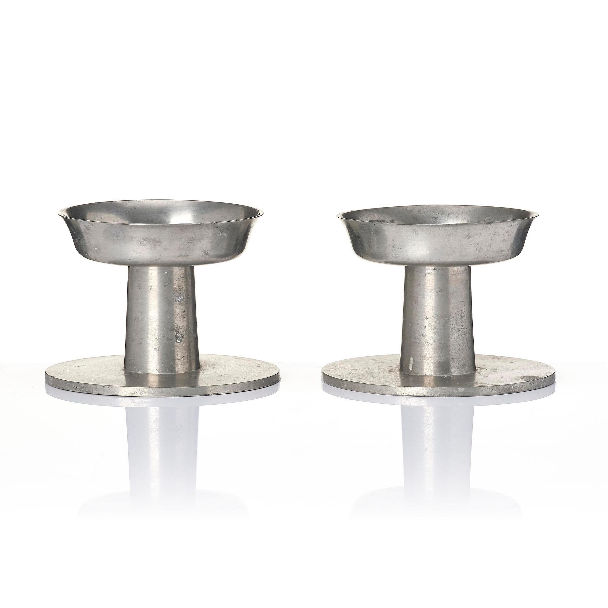 Björn Trägårdh, a pair of pewter candlesticks, Firma Svenskt Tenn, Stockholm, 1930.