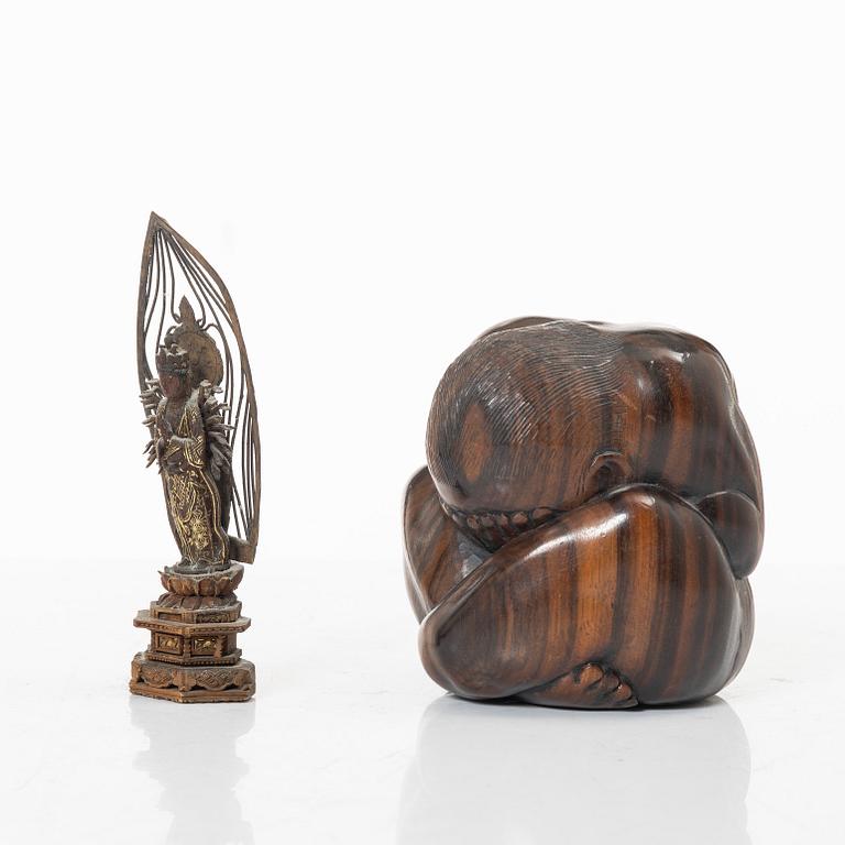 A portable buddhist altar and a figure of 'Weeping Buddha', Japan and Indonesia.