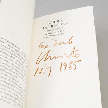 CHRISTO & JEANNE-CLAUDE, a set of three books about "Wrapped Reichtag", signed.