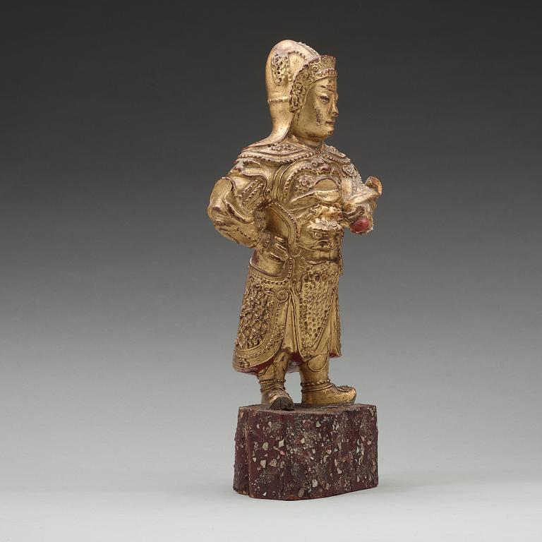 A wood sculpture of a guardian figure, (1644-1912).