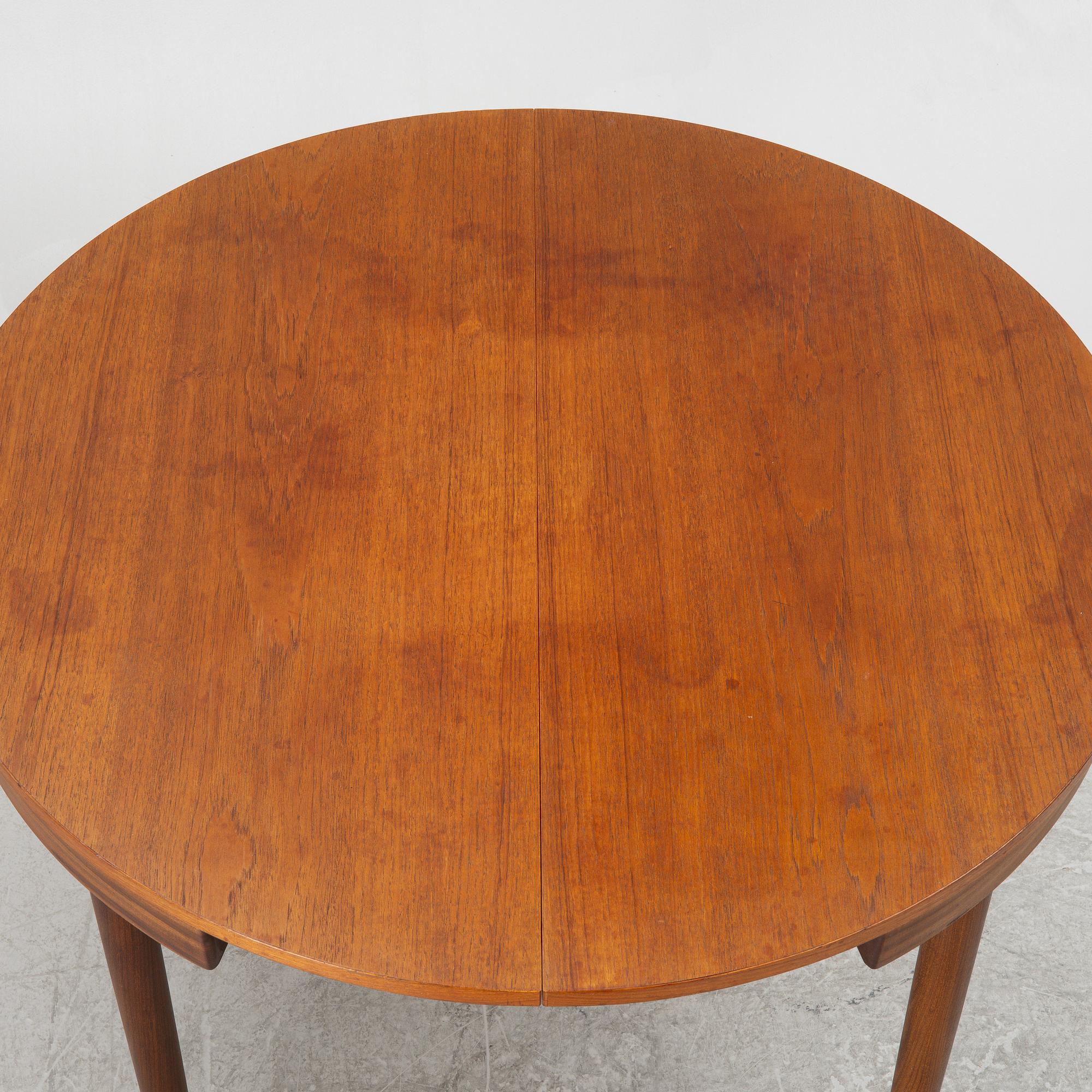 Hans Olsen, a dining table and four chairs, Frem Røjle, Denmark, 1950's.