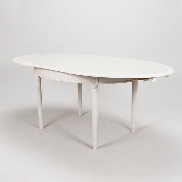 A Gustavian style dining table, mid 20th century.