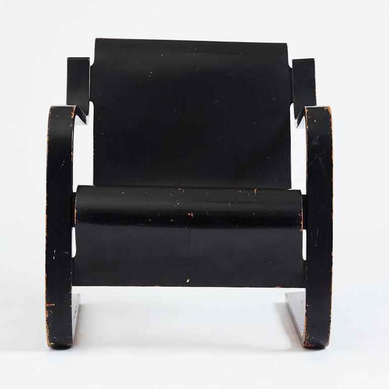 Alvar Aalto, a black lacquered birch cantilevered armchair, "nr 42", O.y Huonekalu-ja Rakennustyötehdas, Finland, 1930's.