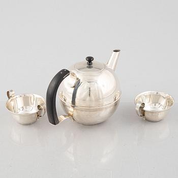 A Swedish Art Déco Silver Coffee Pot, Creamer and Sugar Bowl, mark of CG Hallberg, Stockholm 1936.