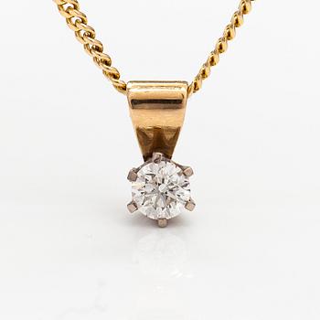 A 14K gold neckalce with a ca. 0.45 ct diamond according to engraving.