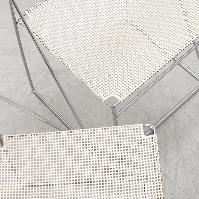 Nils Jörgen Haugesen, a pair of 'X-Line' chairs, Hybodan, Denmark, the model designed in 1977.