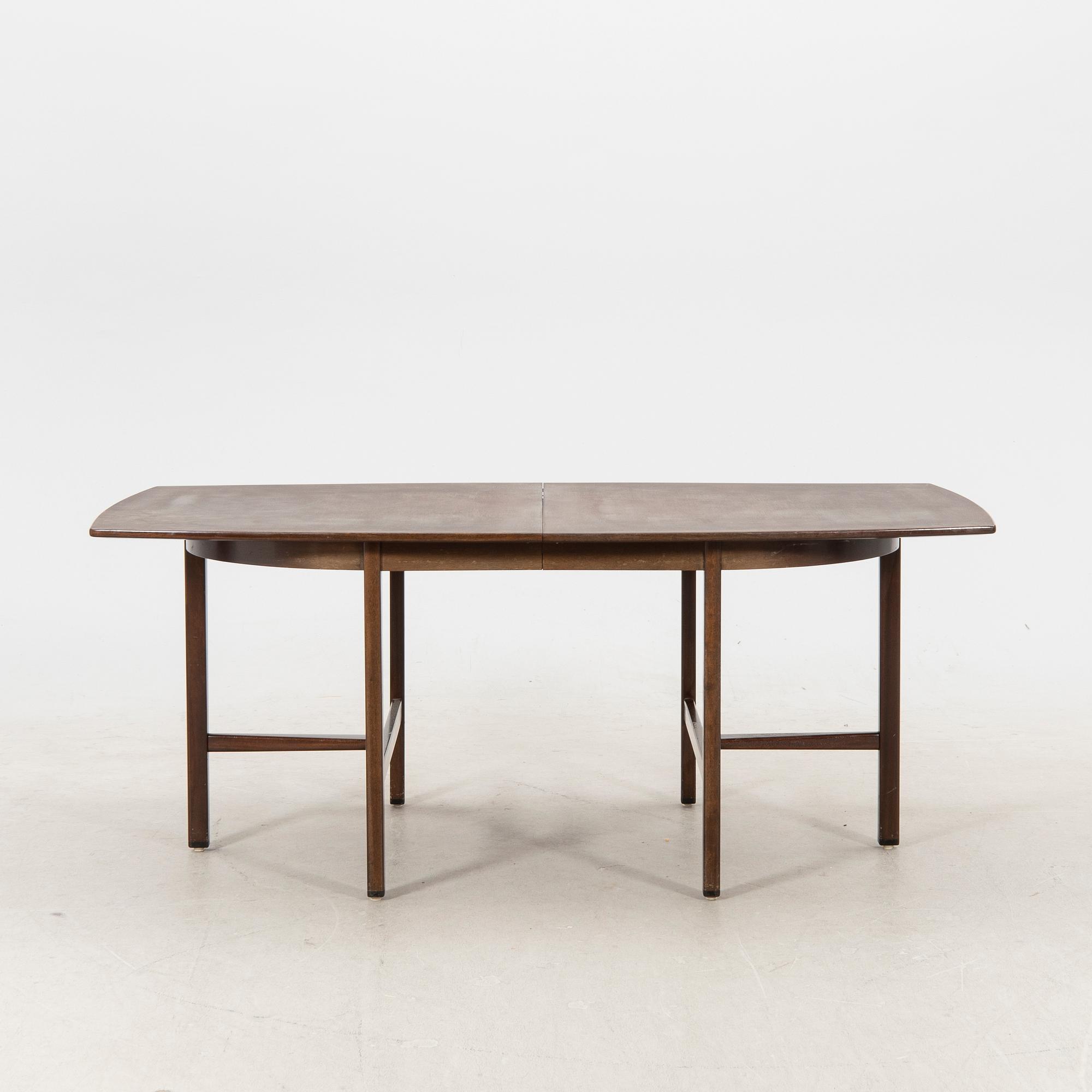 A table and four chairs in lacquered mahogany by David Rosén, "Triva-diné", middle of the 20th century.