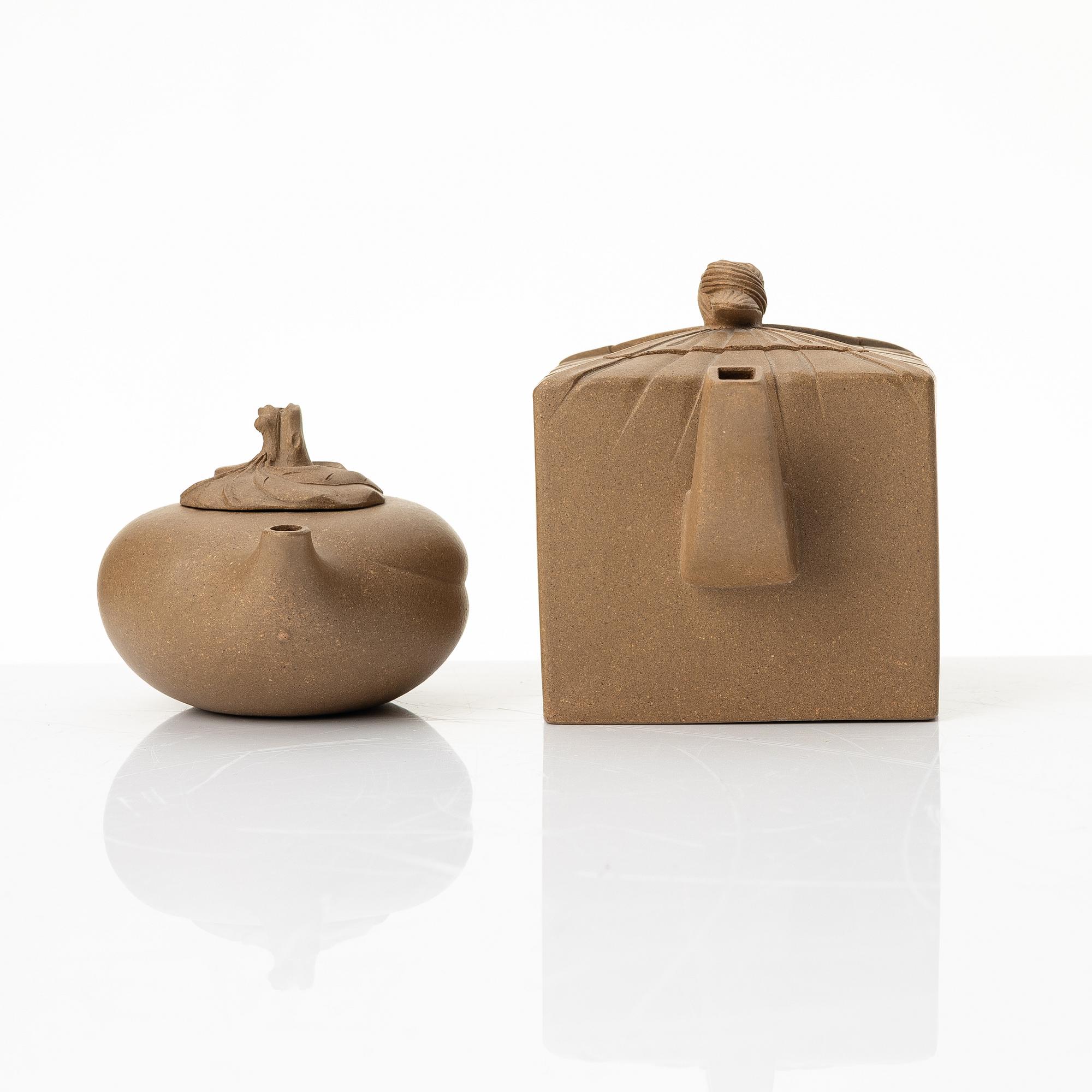 Two yellow yixing teapots, China, 1980/90s.