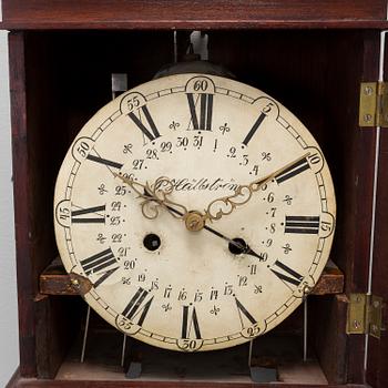 A 19th century wall clock.