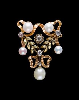 A diamond and natural pearl brooch/pendant. 1890's.