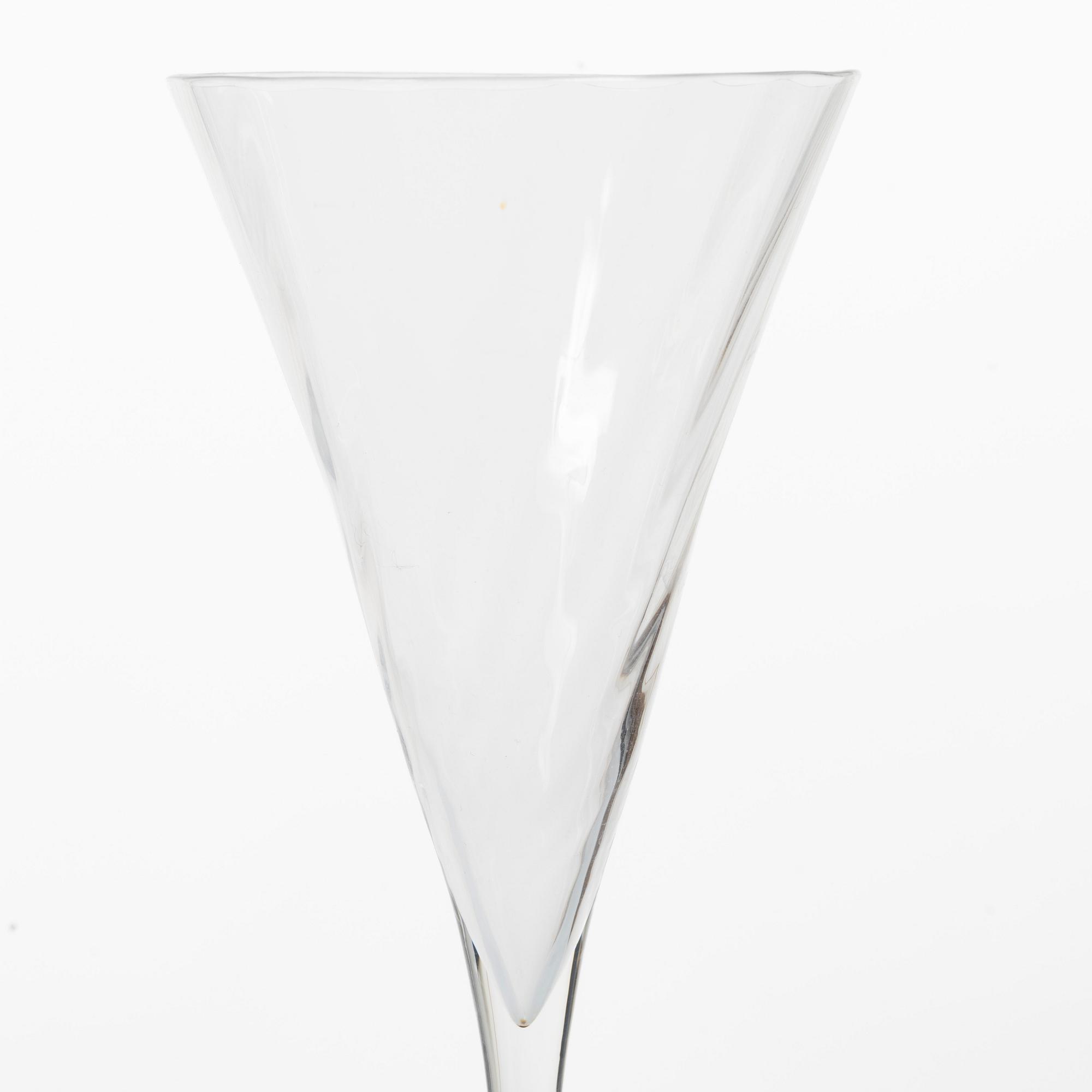 Gunnar Cyrén, A set of 12 champagne flutes, “Helena”, Orrefors.