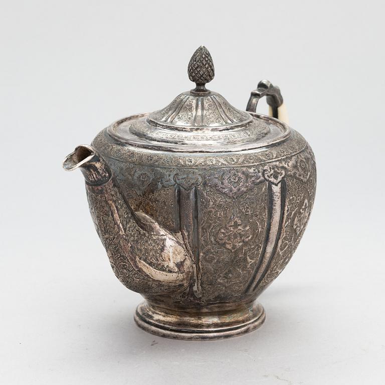 A 7-piece Persian silver tea set, 20th century.