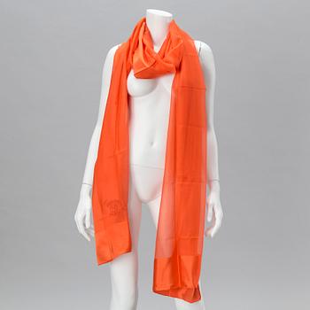 A silk scarf by Hermès.