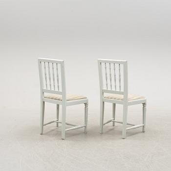 A pair of late gustavian chairs from around year 1800.