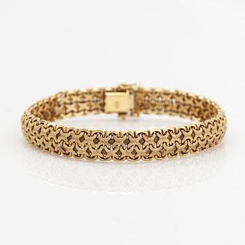 A 14K gold bracelet. Italy.