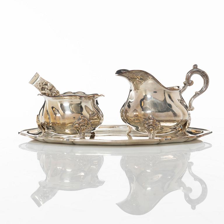 Wilhelm T Binder, sugar bowl, creamer, tray and sugar tong, silver, Schwäbisch Gmünd, Germany, 20th century.