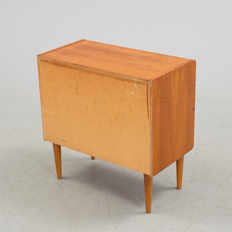 A mid 20th century teak bureau.