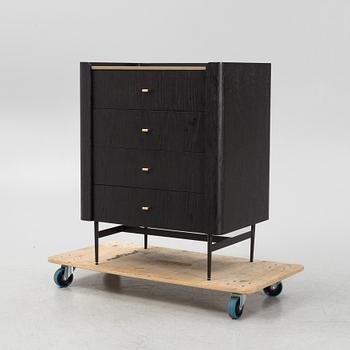 A black stained oak veneered 'Milano' dresser with top covering of faux stingray skin.