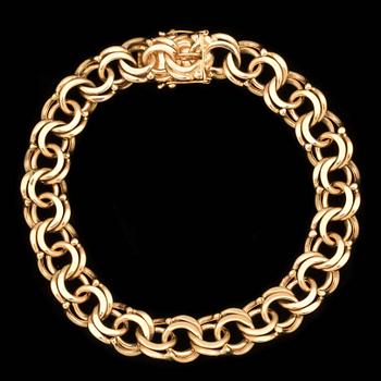 ARMLÄNK, 18 k guld. Vikt ca 36 g.