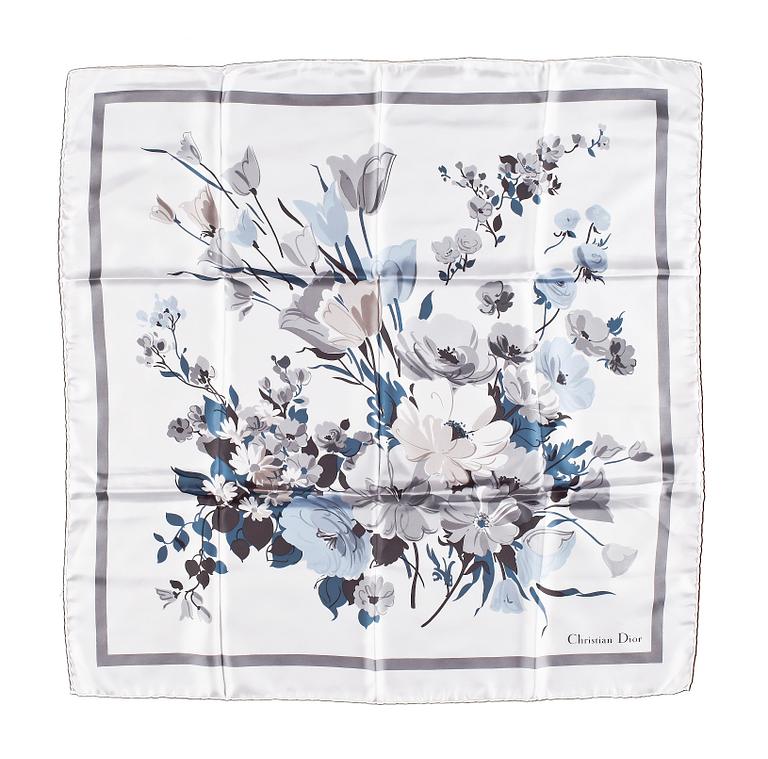 A set of three scarves by Christian Dior, Emilio Pucci and Yves Saint Laurent.
