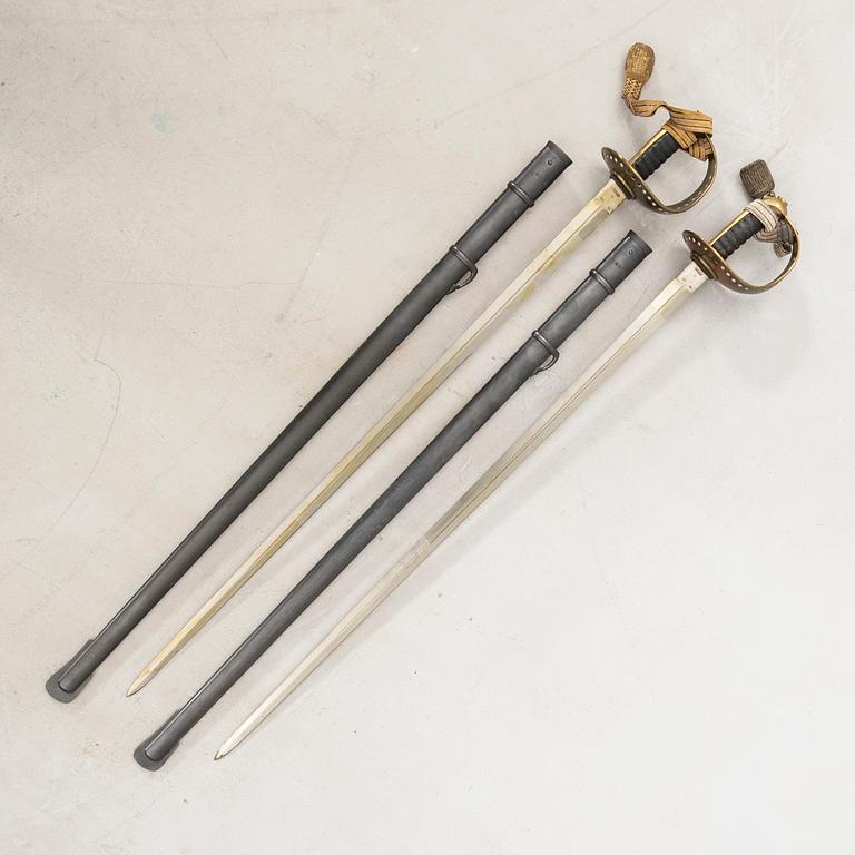 Two Swedish cavalry sabres 1893 pattern, with scabbards.