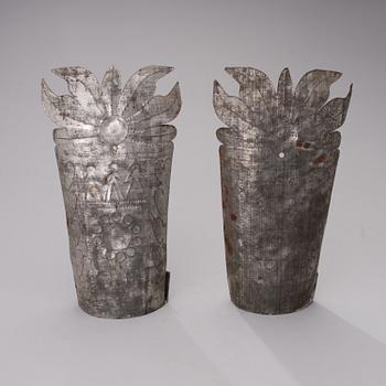 A pair of late 19th century tin wall sconces.
