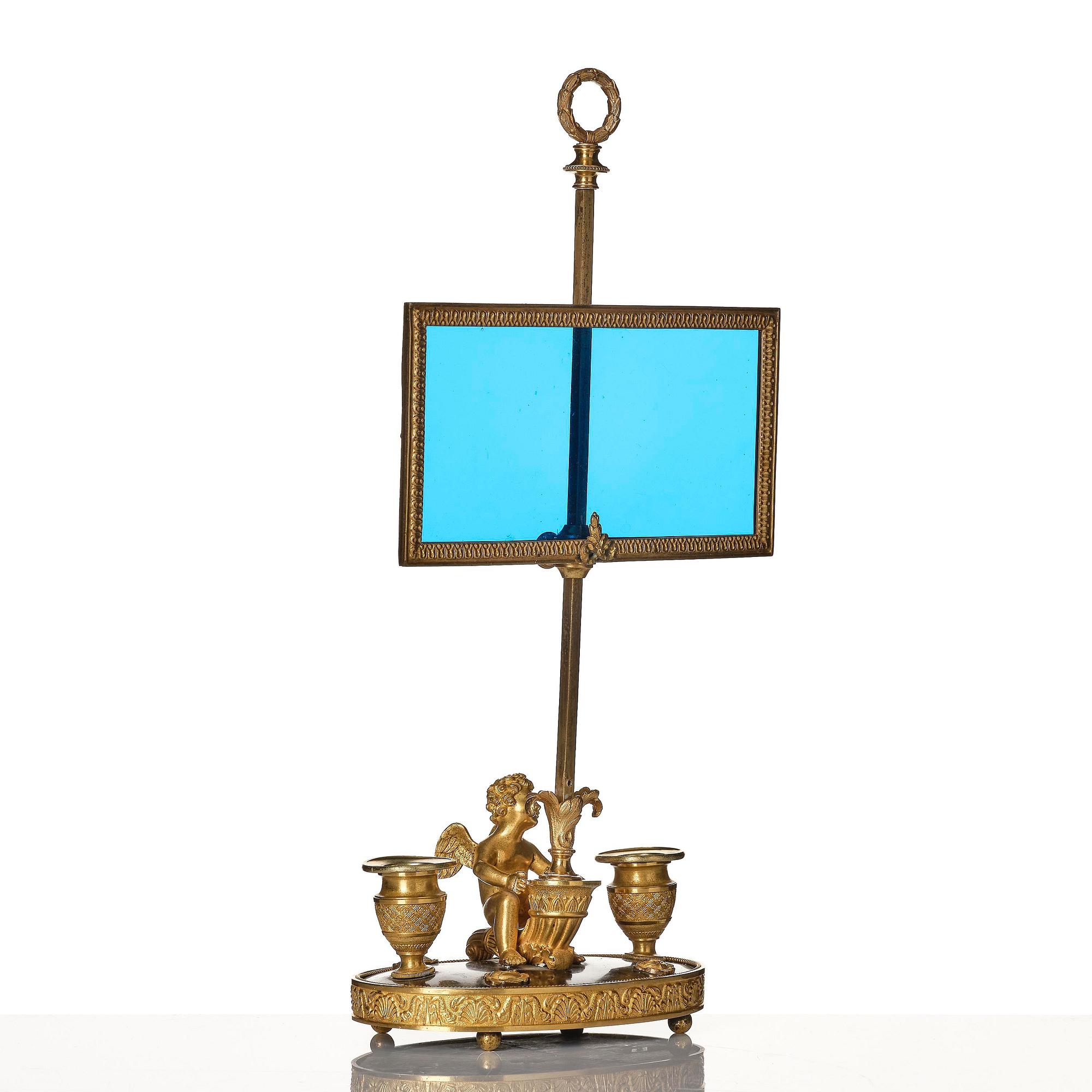 A Russian Empire ormolu and patinated bronse two-light lamp, early 19th century.