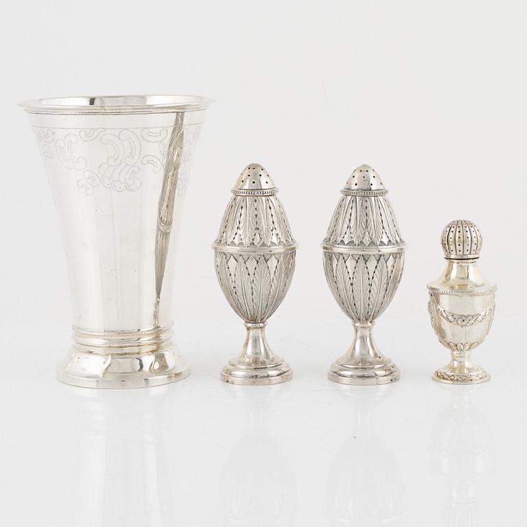Three Silver Shakers and a Beaker.