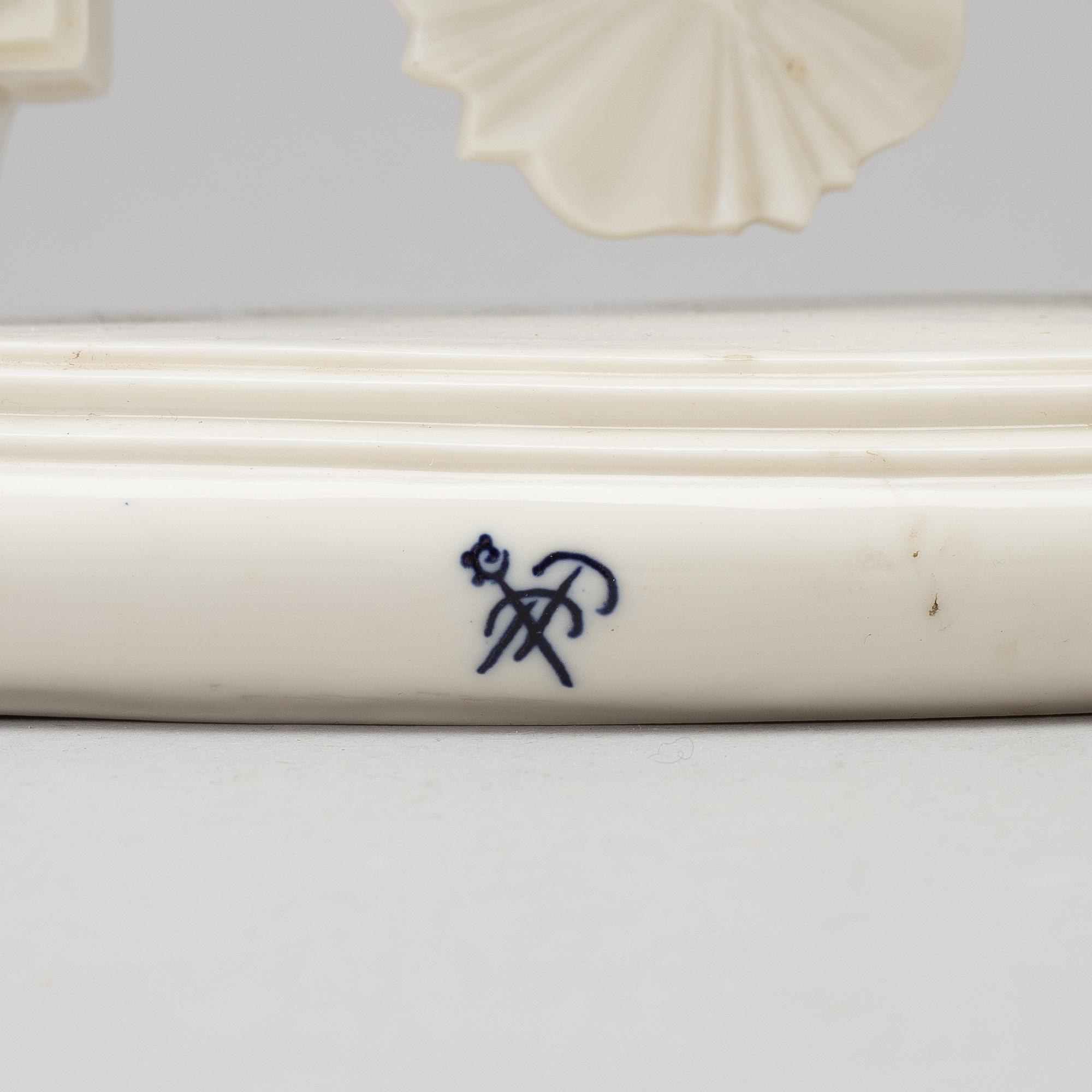 A porcelain mantle clock from Dressel, Kister & Co, Passau, Germany, first half of the 20th Century.