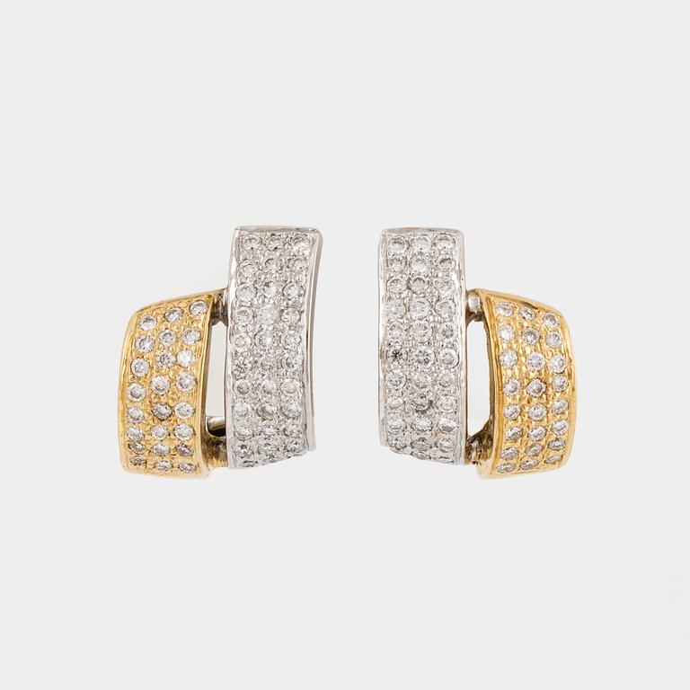 A pair of brilliant cut diamond earrings, total carat weight 0,40ct according to inscription.