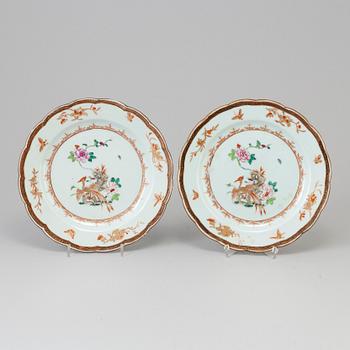 A pair of Chinese porcealin plates, Qianlong (1736-95).