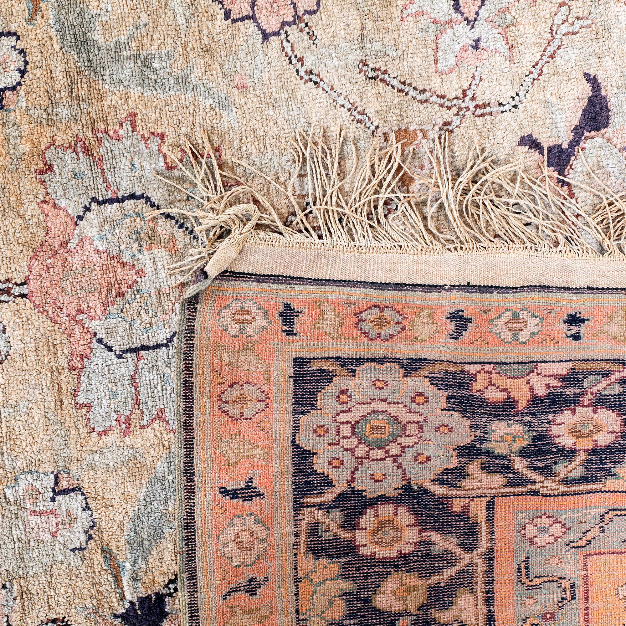 A semiantique Turkish silk carpet ca 183x122 cm.