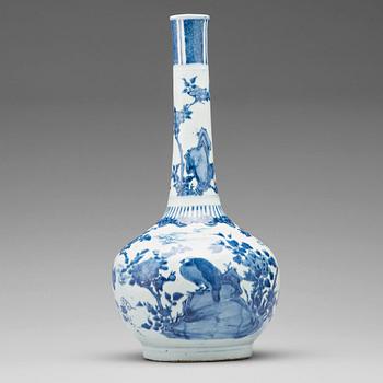 712. A blue and white figural vase, Qing dynasty, Transition, 17th century.