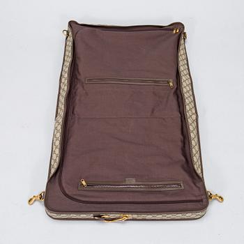 Gucci, a 'Savoy' garment bag.