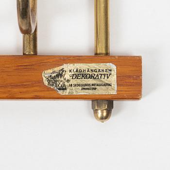 Klädhängare, "Dekorativ", Skoglunds metallgjuteri, Anderstorp, 1950/60-tal.
